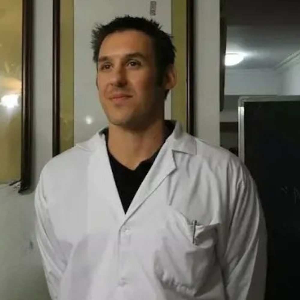 adrian taricani A woman holding her back in pain. The words "hip," "upper back," and "lower back pain" are superimposed on the image.